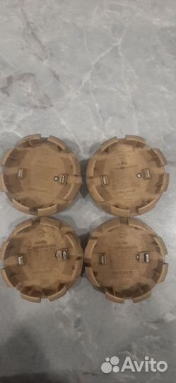 Колпачки на литые диски nissan