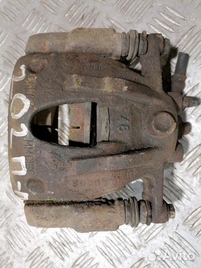 Суппорт передний правый Opel Corsa C