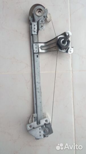 Peugeot (Пежо ) 206 Стеклоподъемник механ. задний