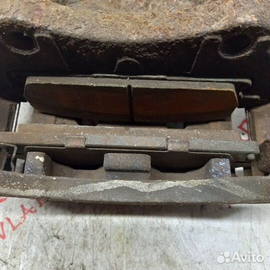 Суппорт тормозной передний правый Nissan X Trail