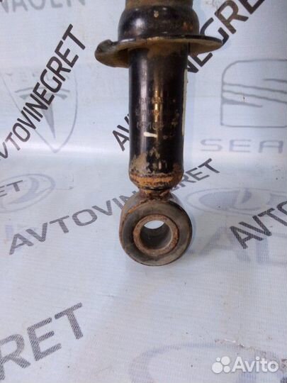 Стойка амортизатор заднего Geely Emgrand EC7