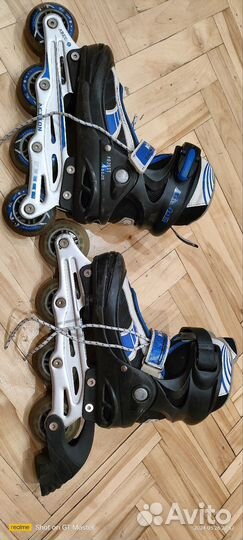 Роликовые коньки