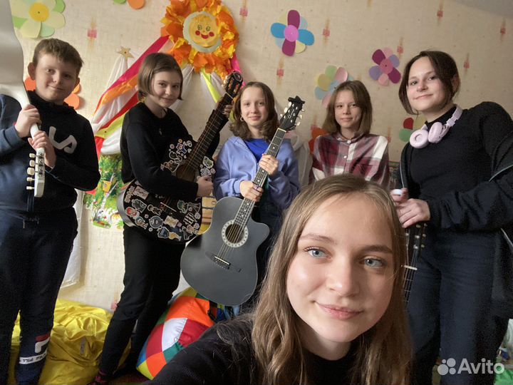 Учитель гитары