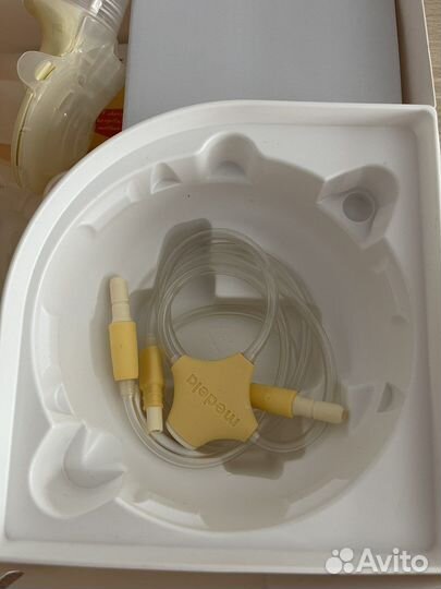 Молокоотсос medela swing maxi & calma