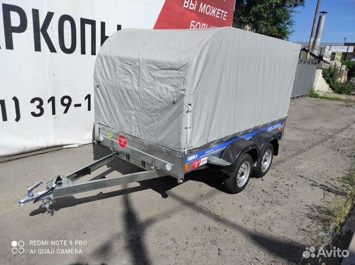 Двухосный легковой прицеп с тентом