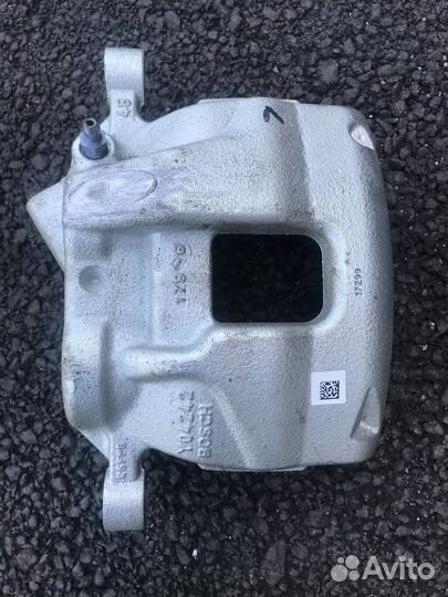 Суппорт тормозной передний левый Transit 1521150