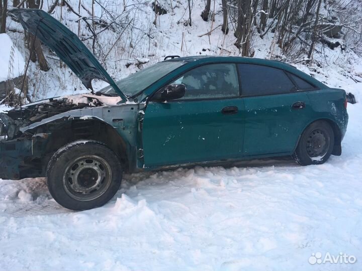 Mazda 323F кузов по частям