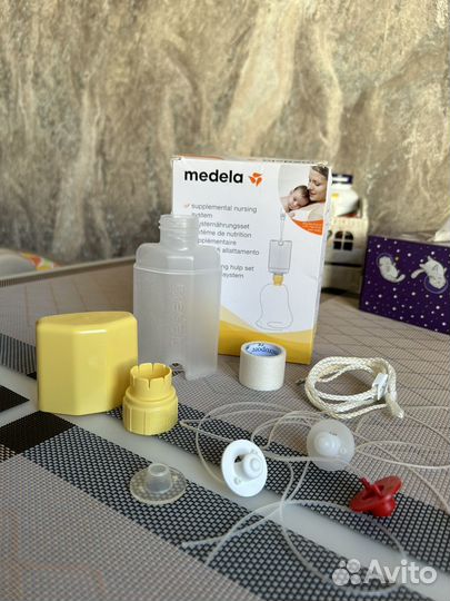 Дополнительная система кормления medela sns