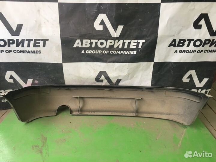 Бампер задний Nissan March K11