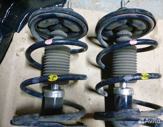 Mitsubishi lancer 10 Стойки амортизатора передние