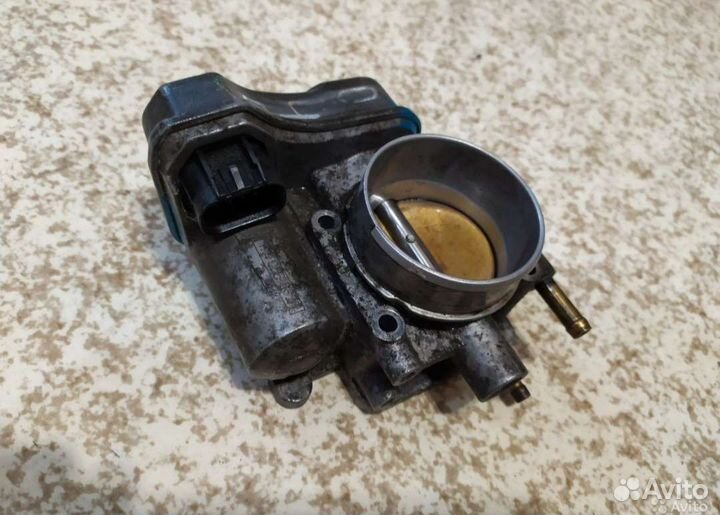 Дроссельная заслонка