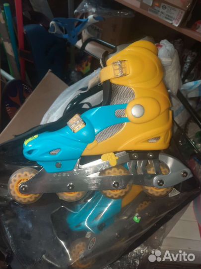 Роликовые коньки