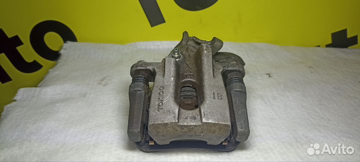 Суппорт задний левый Toyota Corolla 150, Auris