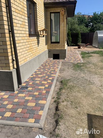 Укладка тротуарной плитки брусчатки