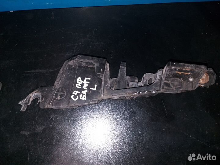 Кронштейн переднего бампера левый Ситроен С4