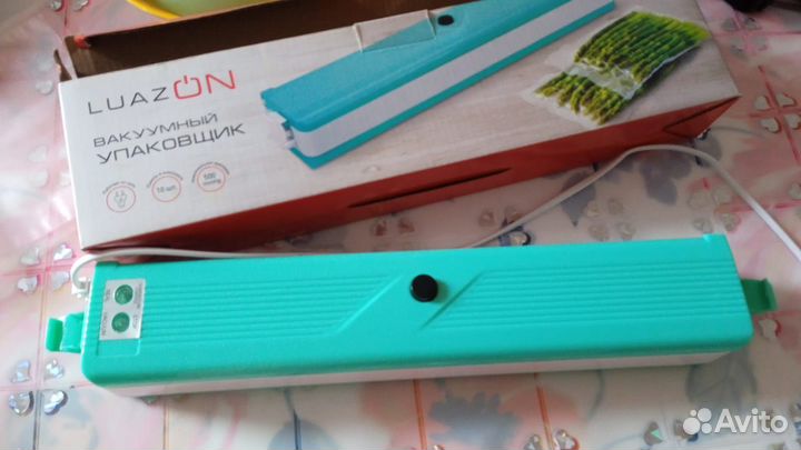 Вакуумный упаковщик продуктов