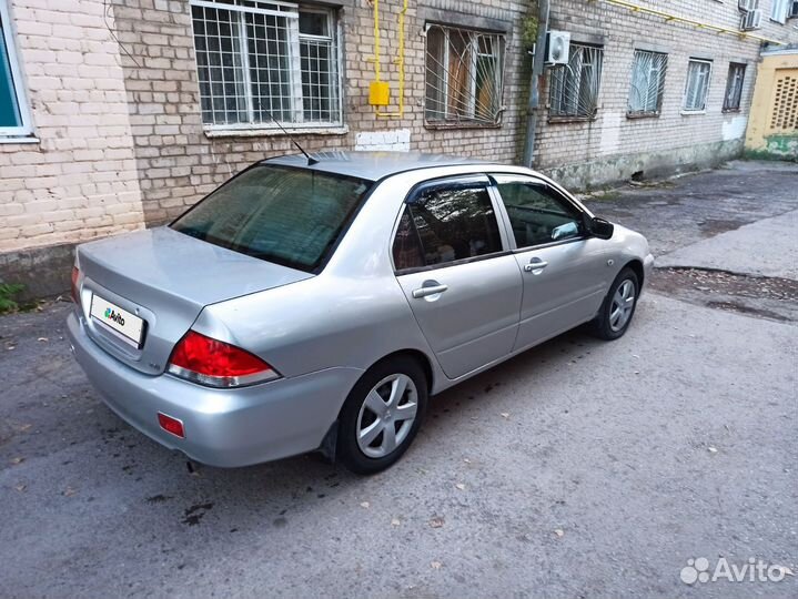 Mitsubishi Lancer 1.6 МТ, 2004, 198 000 км