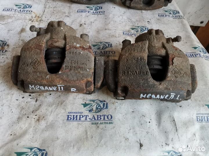 Суппорт тормозной передний Renault Megane II реста