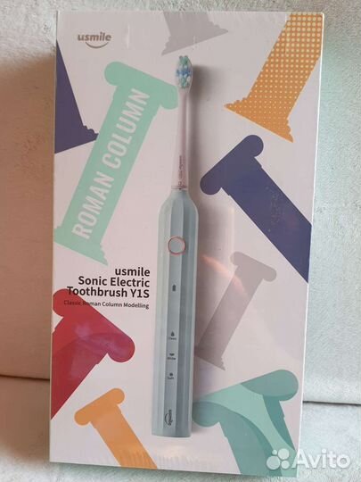 Электрическая зубная щетка