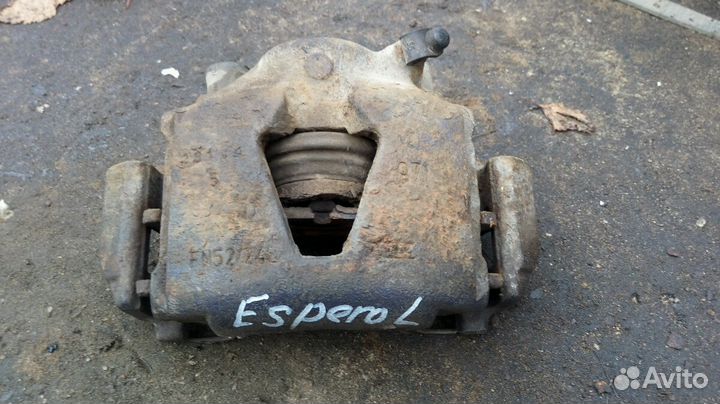 Суппорт левый Daewoo Espero