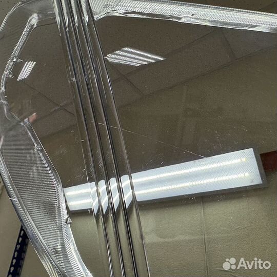 Уцененное стекло для фары Nissan Pathfinder/Navara