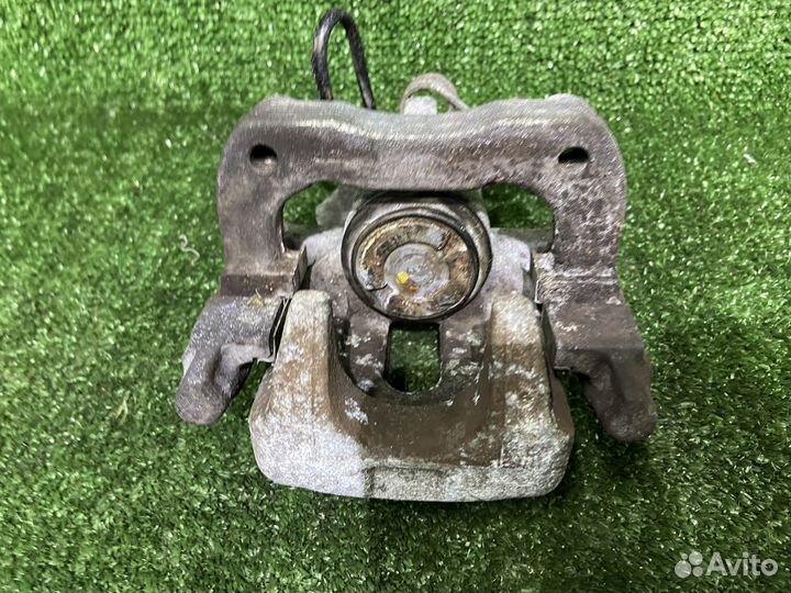 Суппорт тормозной задний правый Peugeot 308