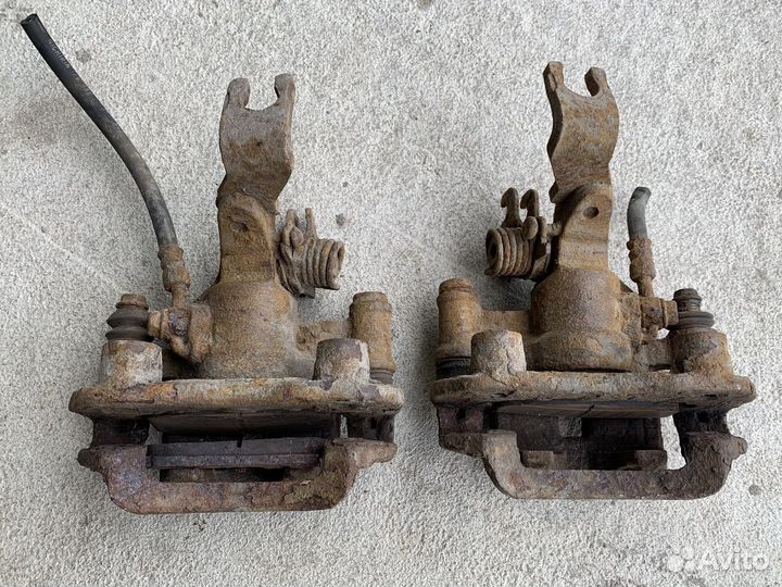 Суппорт тормозной задний Mazda 626 GF