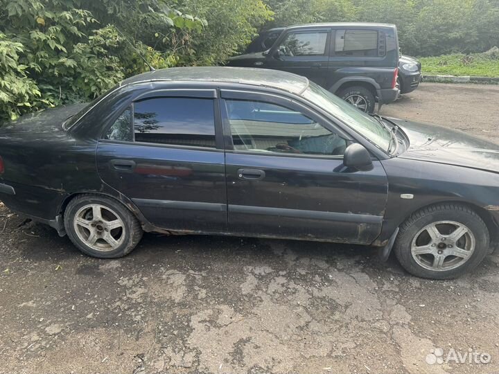 Mitsubishi carisma разбор