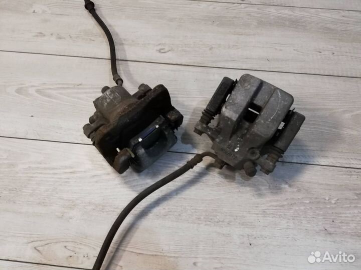 Суппорт тормозной задний в сборе Toyota Rav4 XA40