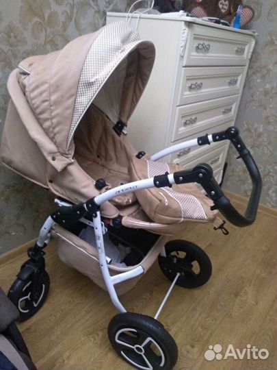 Прогулочная коляска три в одном