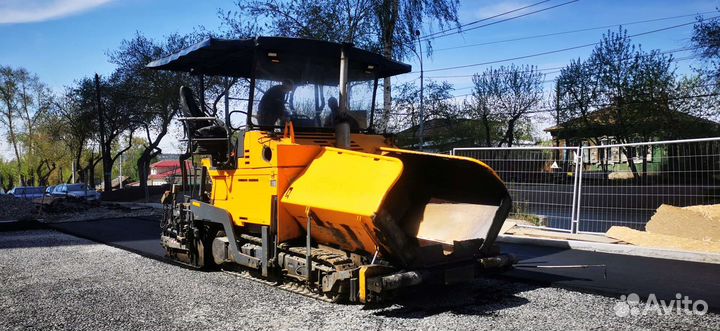 Машинист асфальтоукладчика