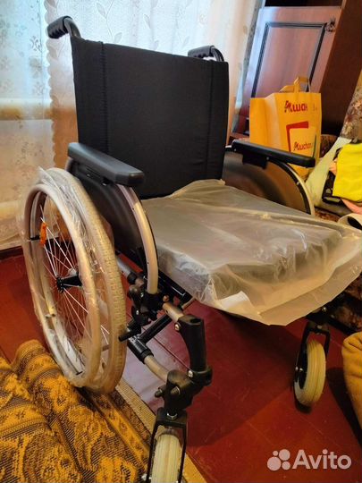 Инвалидная коляска новая
