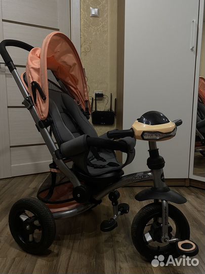 Трехколесный детский велосипед-коляска