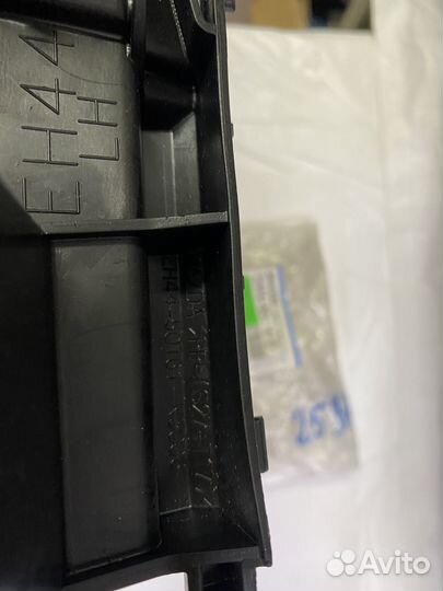 Mazda EH4450161D Кронштейн левый под фарой бампера