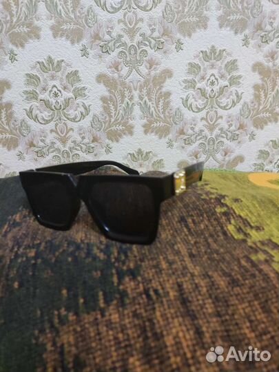 Солнцезащитные очки женские брендовые