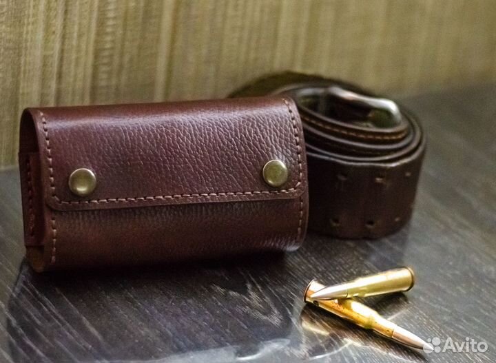 Стопки из гильз 2А42 в кожаном патронташе