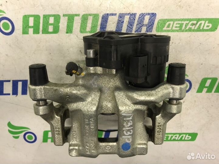 Суппорт тормозной задний правый Mazda 3 BP PE / P5