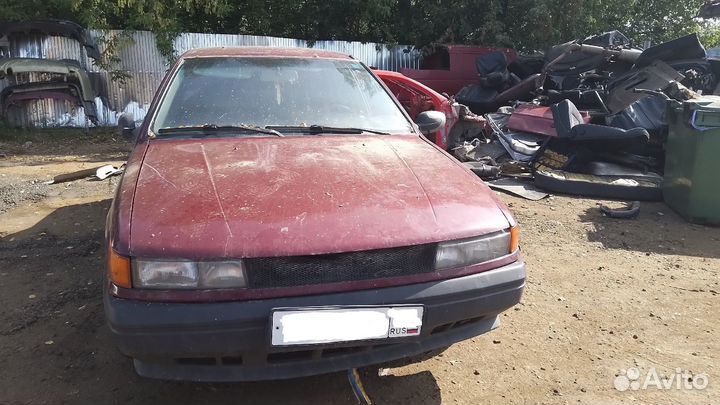 В разборе Mitsubishi Lancer 5