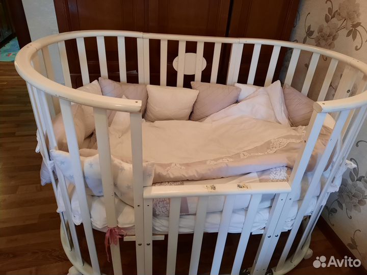 Детская кроватка с маятником круглая-овальная