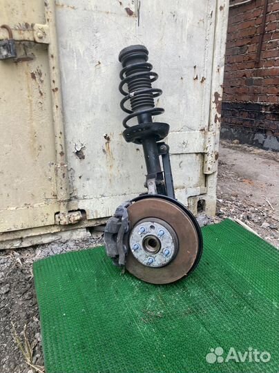 Амортизатор передний левый Opel Astra J