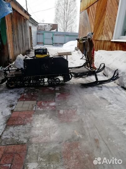 Мотобуксировщик с лыжным модулем с авторевирсом