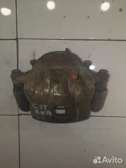 Суппорт передний левый Kia Sportage 2 (JE, KM) 200