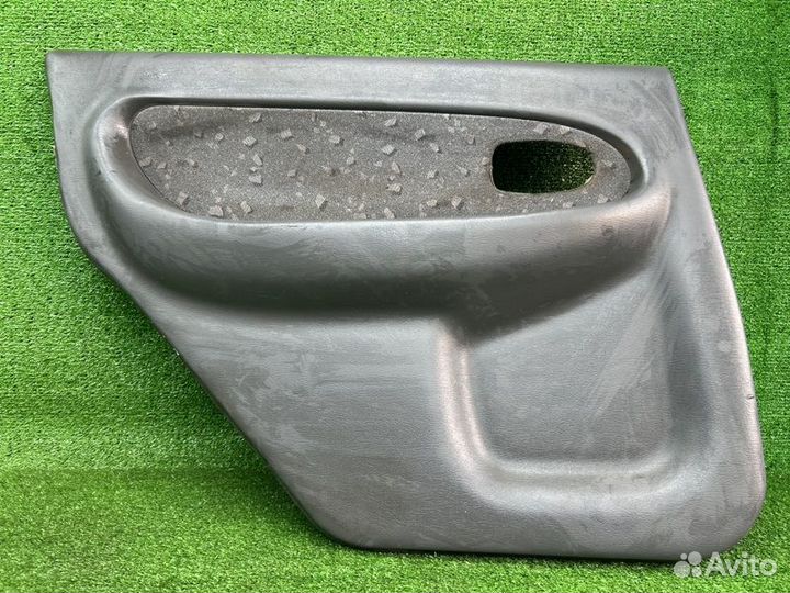 Обшивка двери задняя левая Kia Spectra