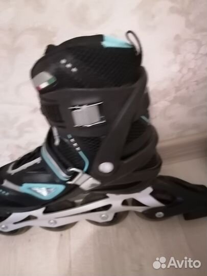 Роликовые коньки