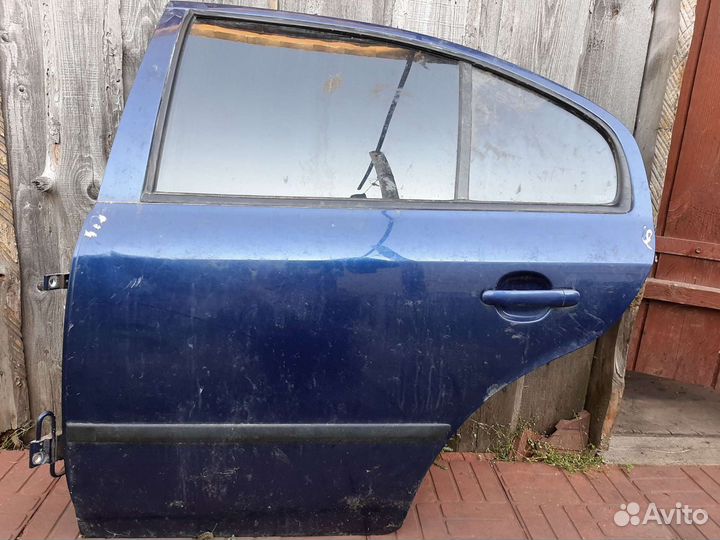 Дверь Шкода Октавия Тур