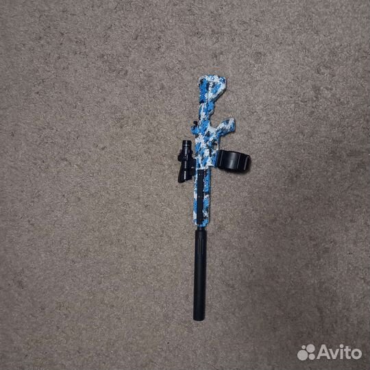 Игрушечный автомат с орбизами