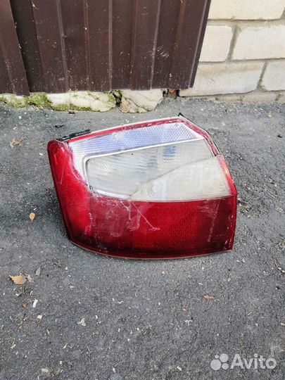 Фонарь задний левый ауди А4 Б6