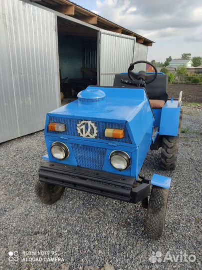 Мини-трактор, 2002