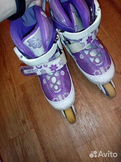 Роликовые коньки