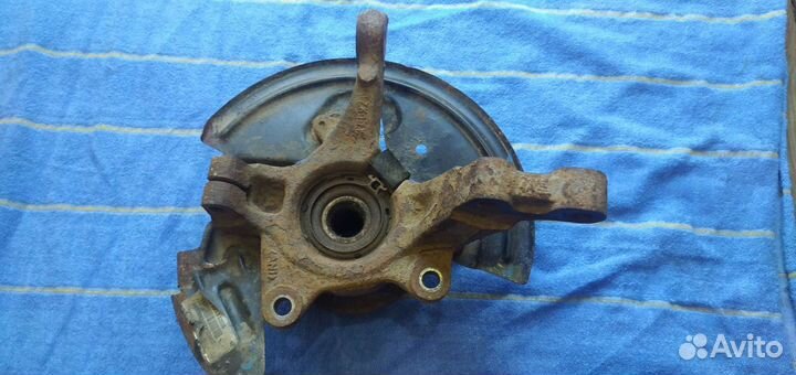 Поворотный кулак renault logan 1 левый